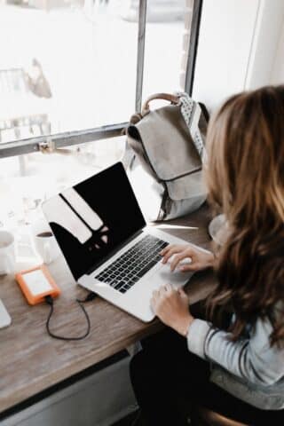 Person Working On A Computer